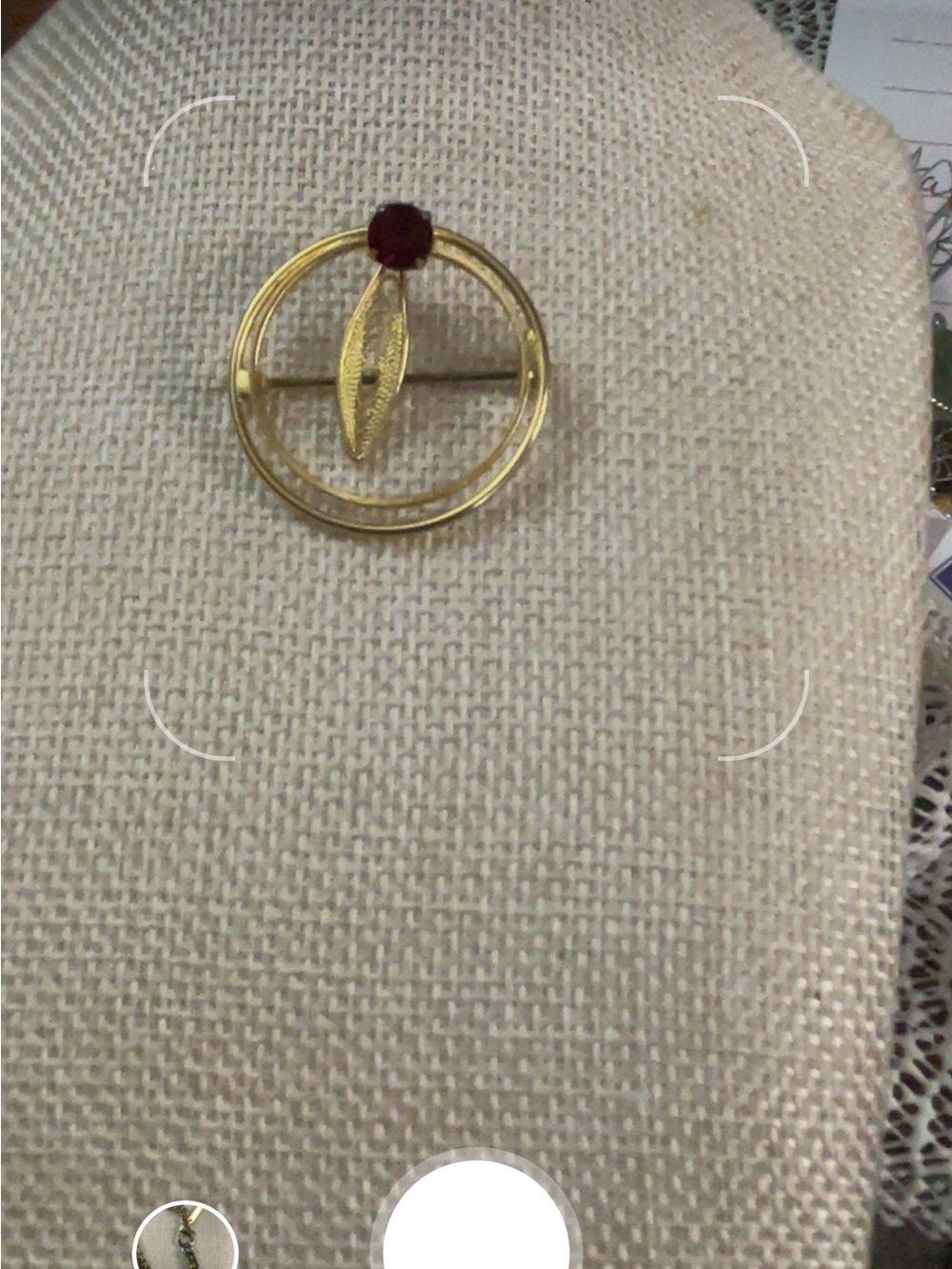 vintage Carl Art 12k gold-filled brooch with a red rhinestone and cannetille